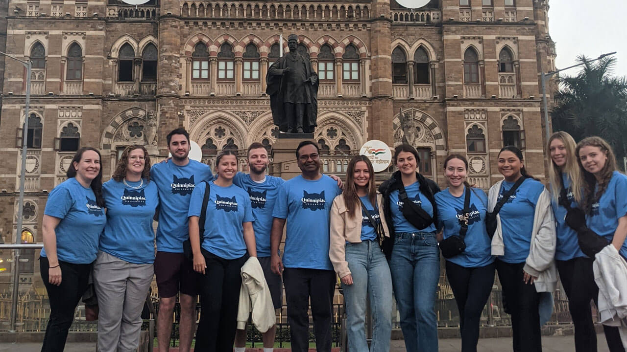 MBA students studying in India pose for a photo.