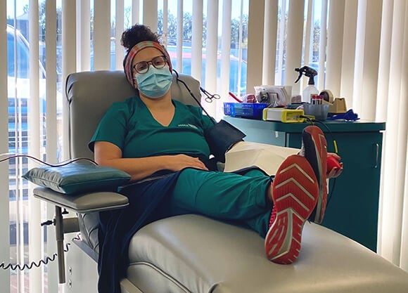 Katherine Chinnici donates plasma.