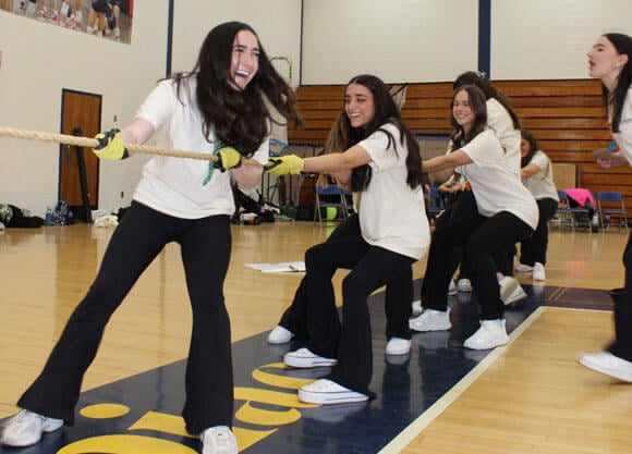 Photo of Kappa Delta's playing tug-of-war at Shamrock the Rope