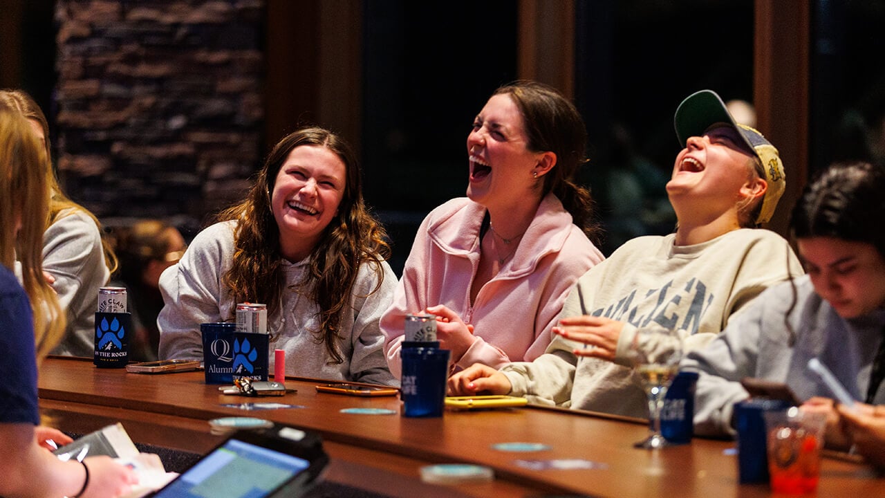 Students coming together at the campus pub and grill