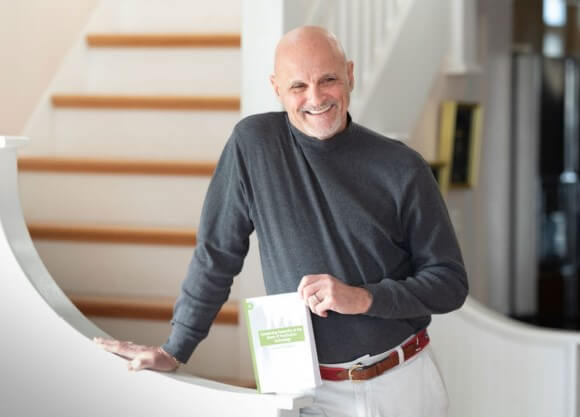 Carvalko holding his book