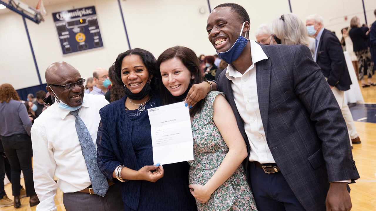 Students celebrate clinical matches with their families.