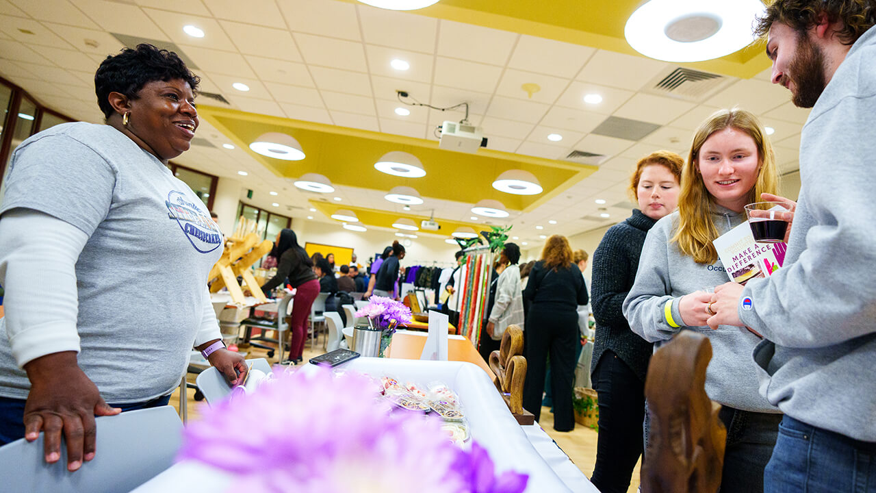 Sip and shop participant looking at products