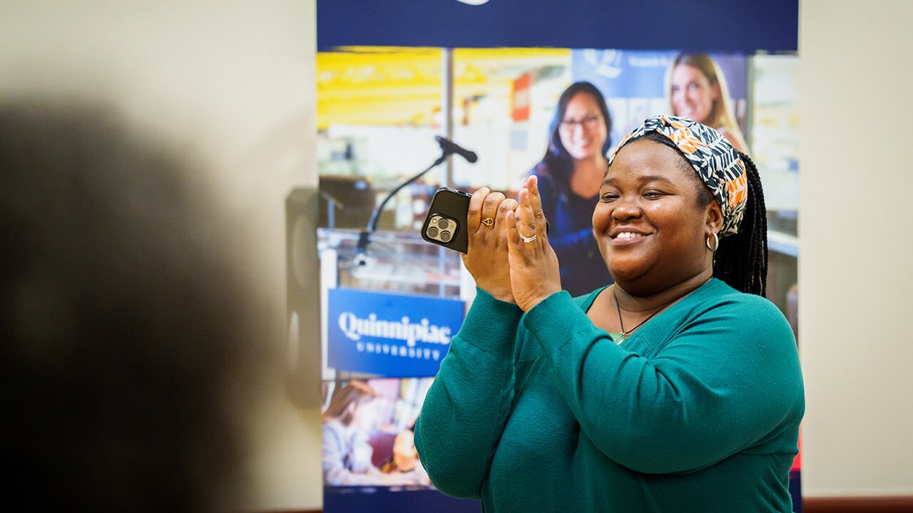 Woman clapping in celebration