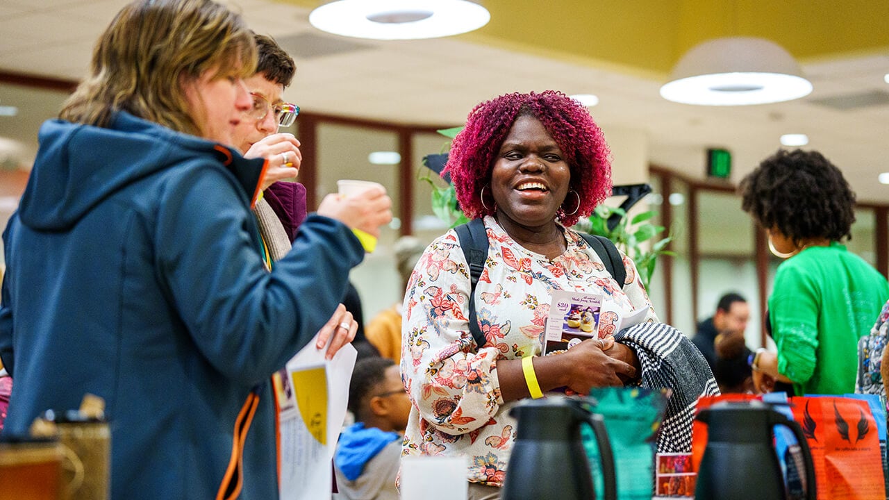 Sip and shop participants smiling