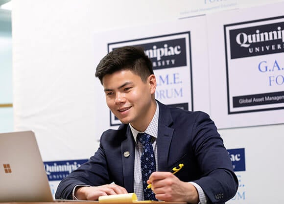 male student on computer