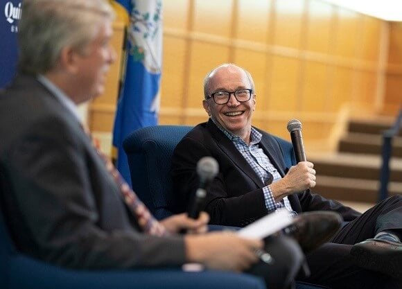 Murray gestures with his microphone