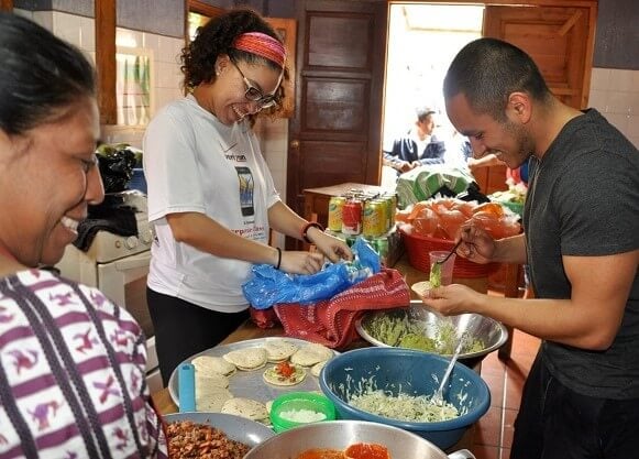 Students prepare food.