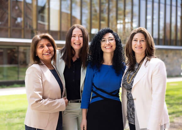 The new co-directors of the M&T Bank Center for Women & Business posing in front of the health and wellness center