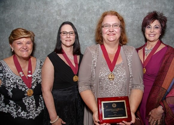 Professor Laima Karosas, fellow in the American Academy of Nursing Practitioners, with her sponsors.