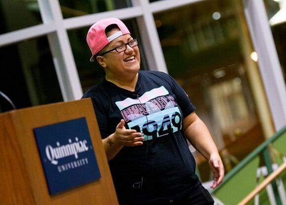 Gabby Rivera, the first queer Latina to write for Marvel Comics, speaks to a crowd.