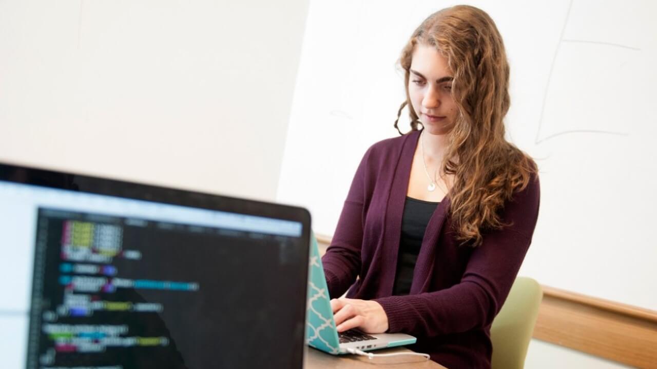 Janine Jay '18 competes in a hackathon.