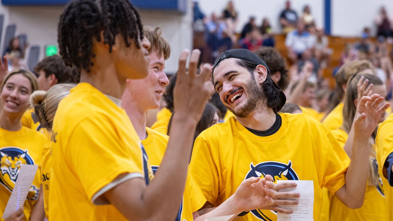 A group of incoming first-year students laughing
