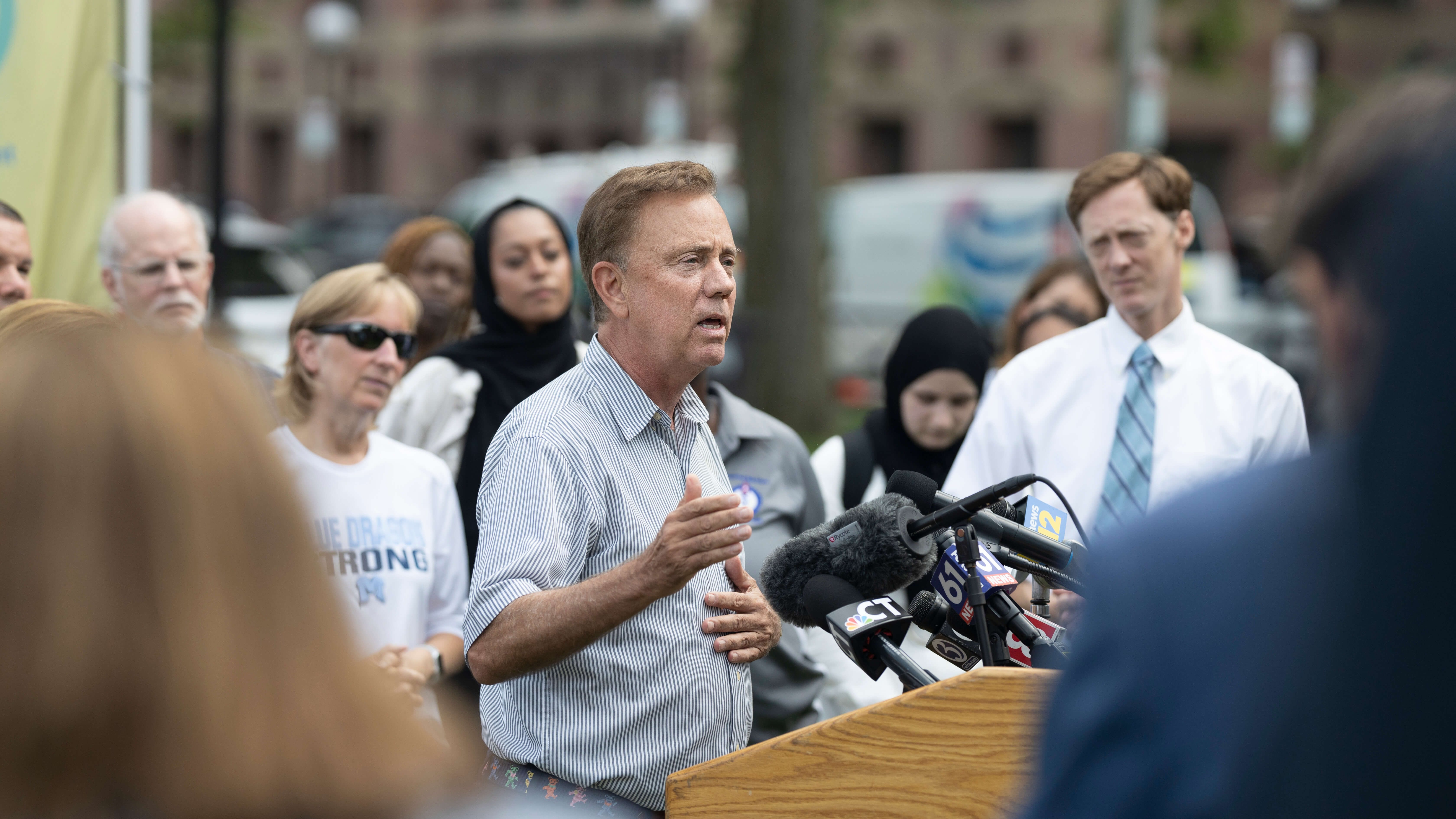 College Corps students set to begin vaccine outreach among New Haven residents were acknowledged at a press conference held by Gov. Ned Lamont