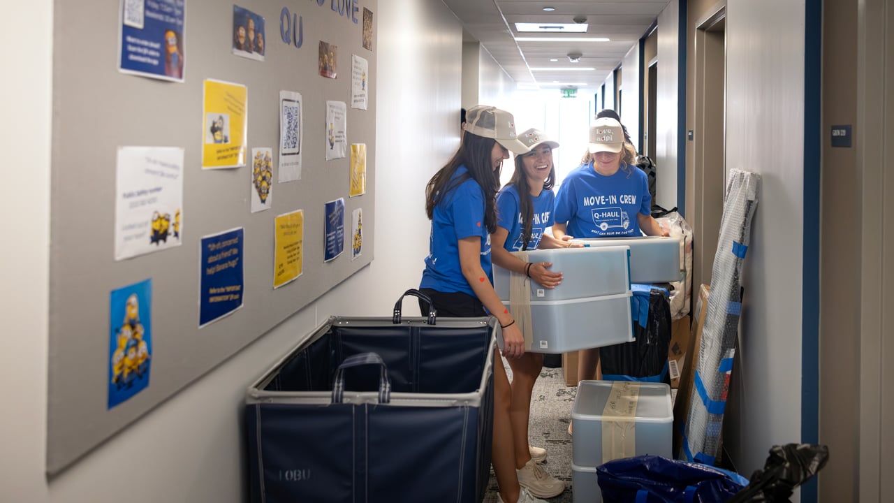 Students with laundry carts