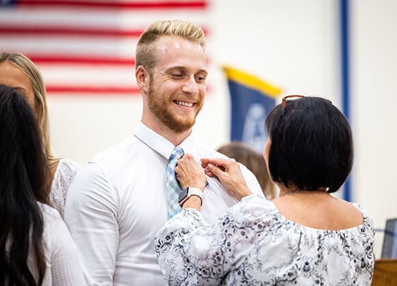 A student is pinned.