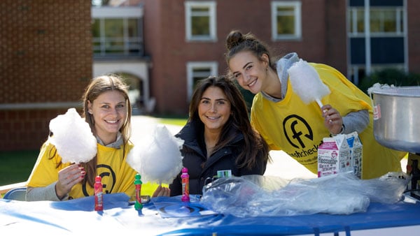 Students enjoy cotton candy during Fresh Check Day