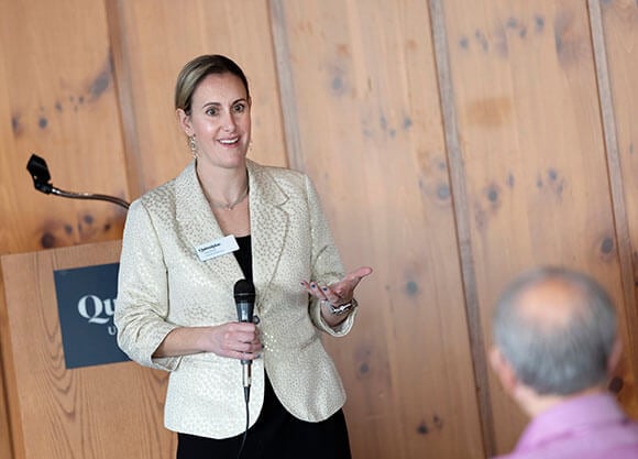 Professor Amy Paros speaks to students.