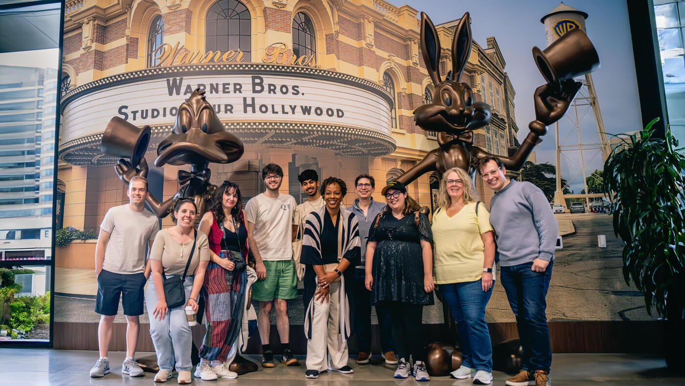 Quinnipiac University faculty and students pose at the Warner Bros studio tour in Los Angeles.