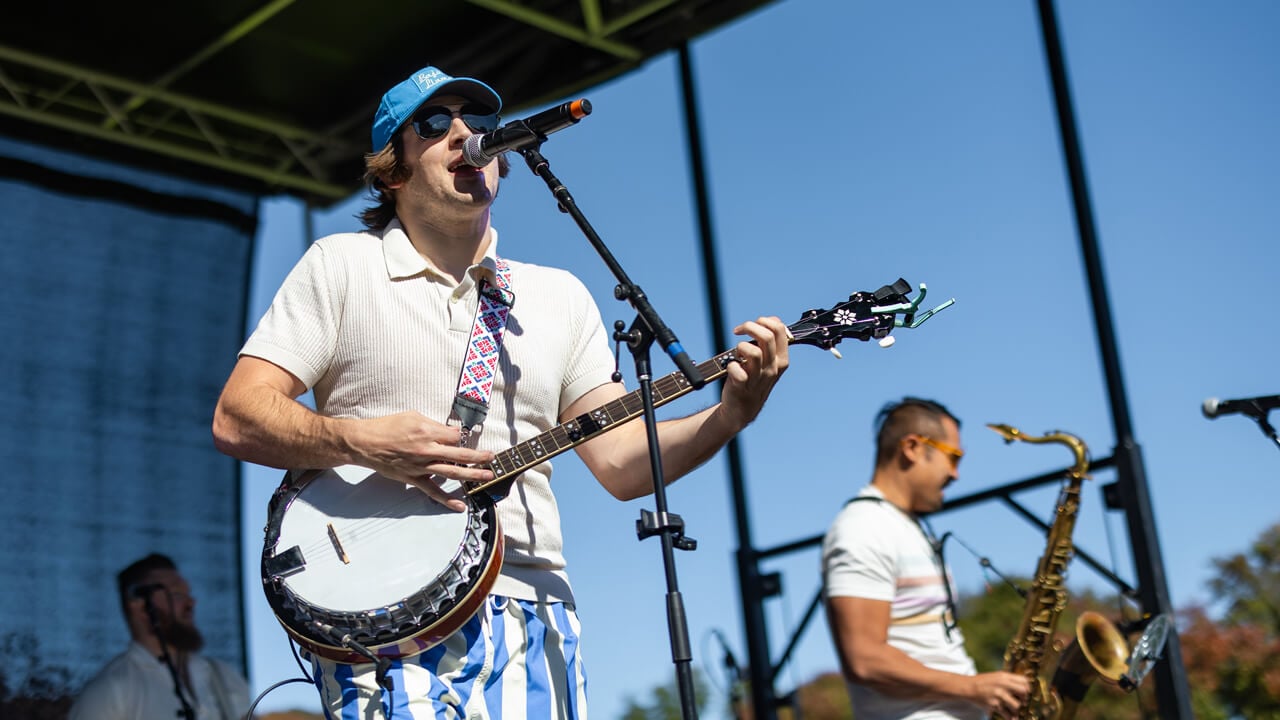 A person sings into the microphone