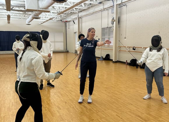 Sandra Marchant teaching two students