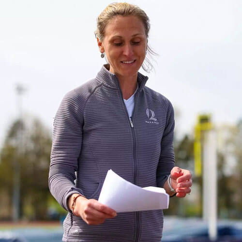 Photo of Carolyn Martin, head women's cross country and women's track and field coach.