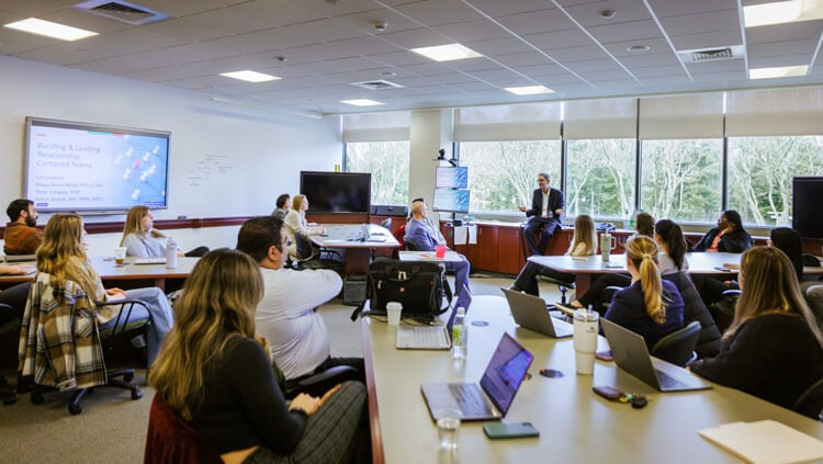 Faculty members participate in a workshop on the North Haven campus.