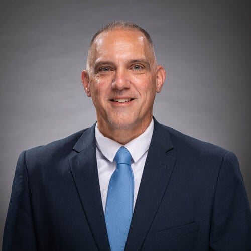 Headshot of John Powers, assistant professor of interactive media and design director, and the interactive media and communications graduate program.