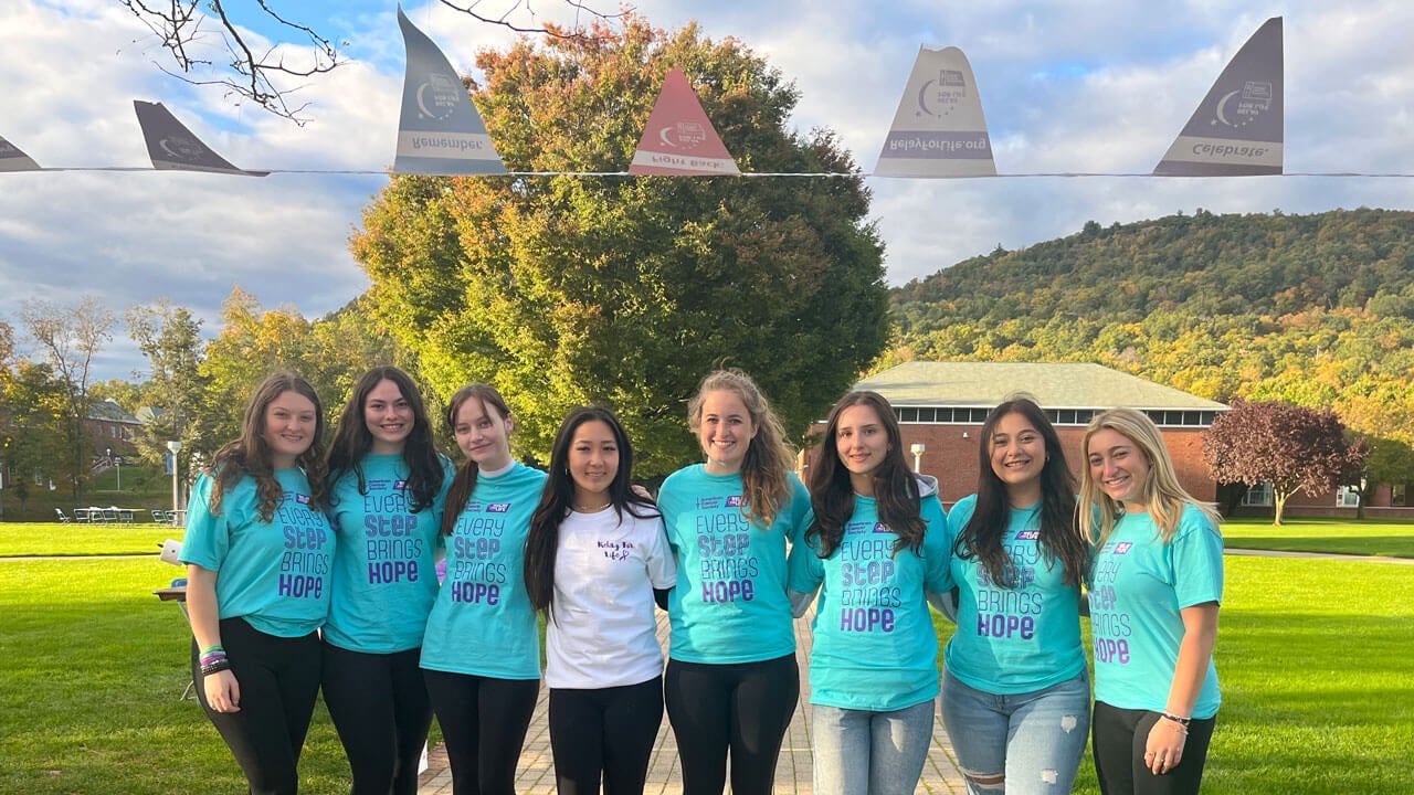 A group of girls wearing Relay for Life tshirts on the quad.