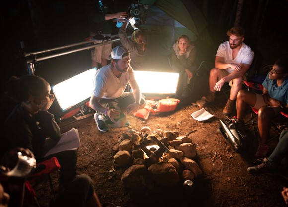 Joe Marcello directs one of his short films outside at a campsite.