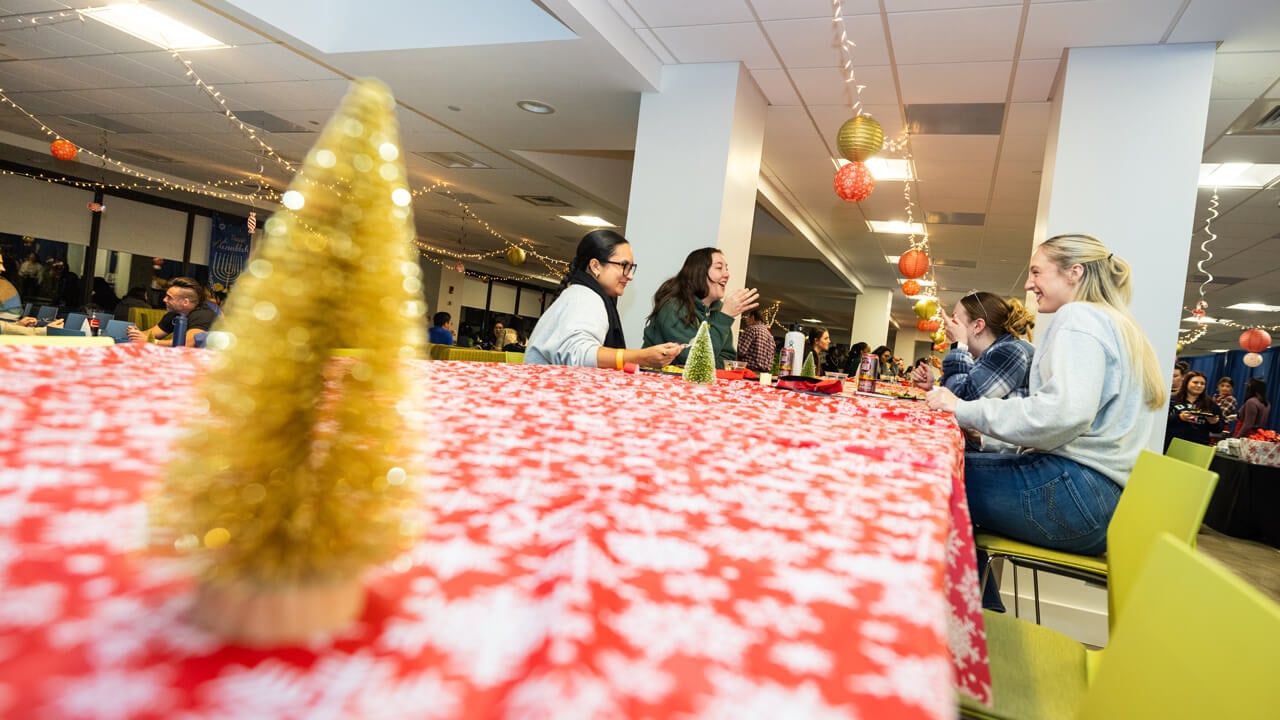 People sitting at a table from the distance