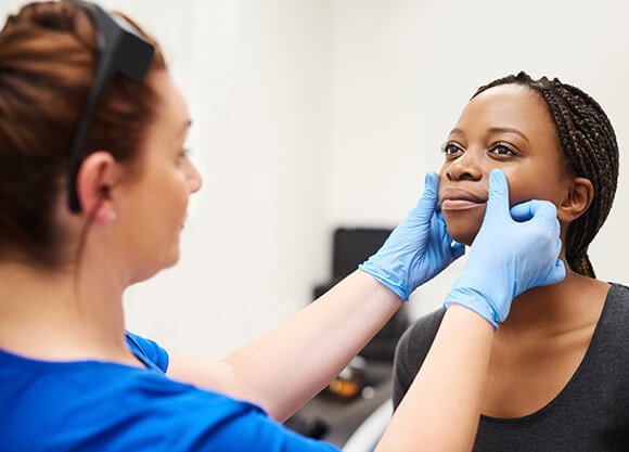 Patient gets her skin checked