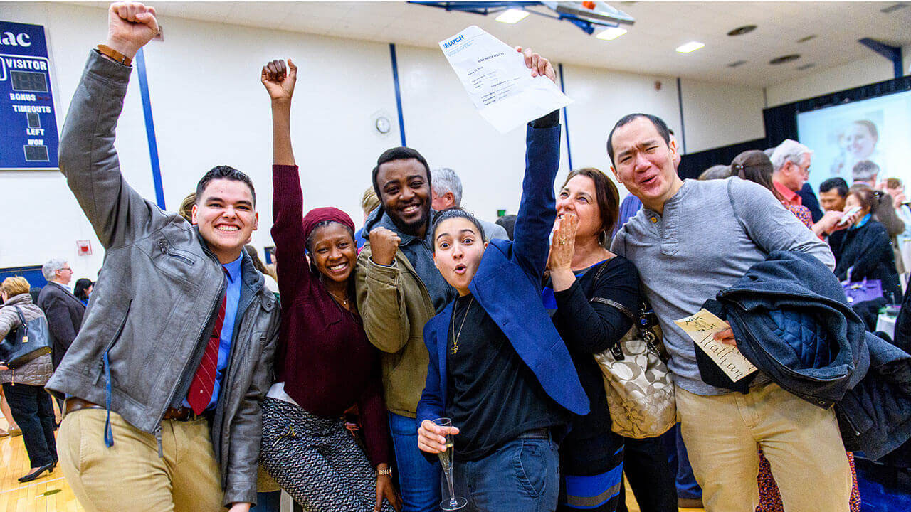 Students cheer.