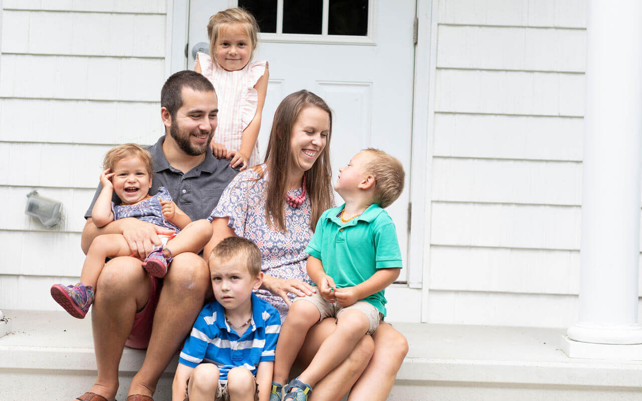 Family on front stoop