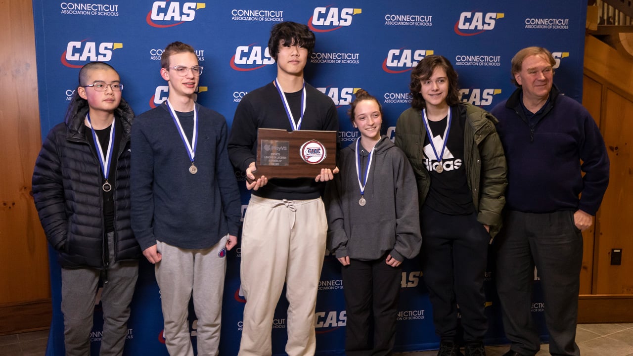 CIAC eSports League of Legends champions stand together posed for a photo.