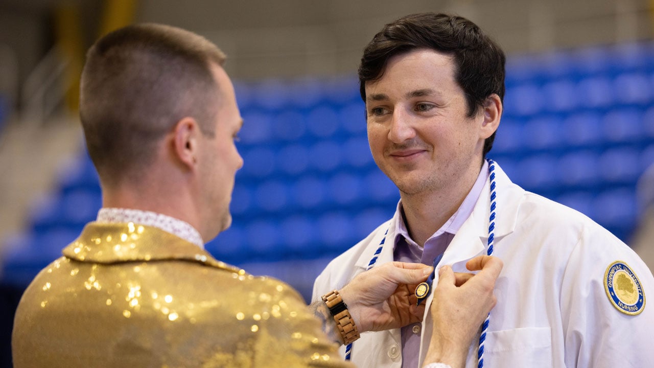 School of Nursing student receives pin at pinning ceremony