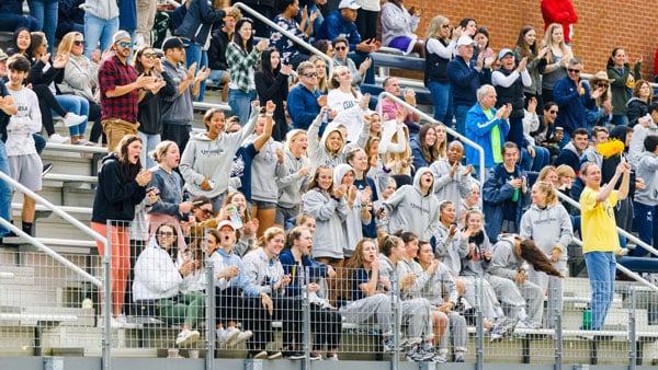 Crowd cheers loud for the Women's Soccer Team at the Soccer and Lacrosse Stadium