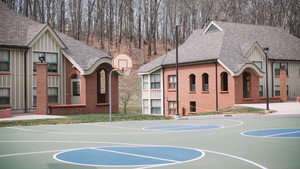 The basketball courts located outside the Townhouse Residence's on York Hill Campus