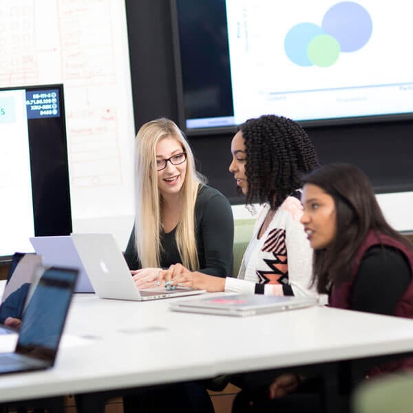 Students learn a business classroom