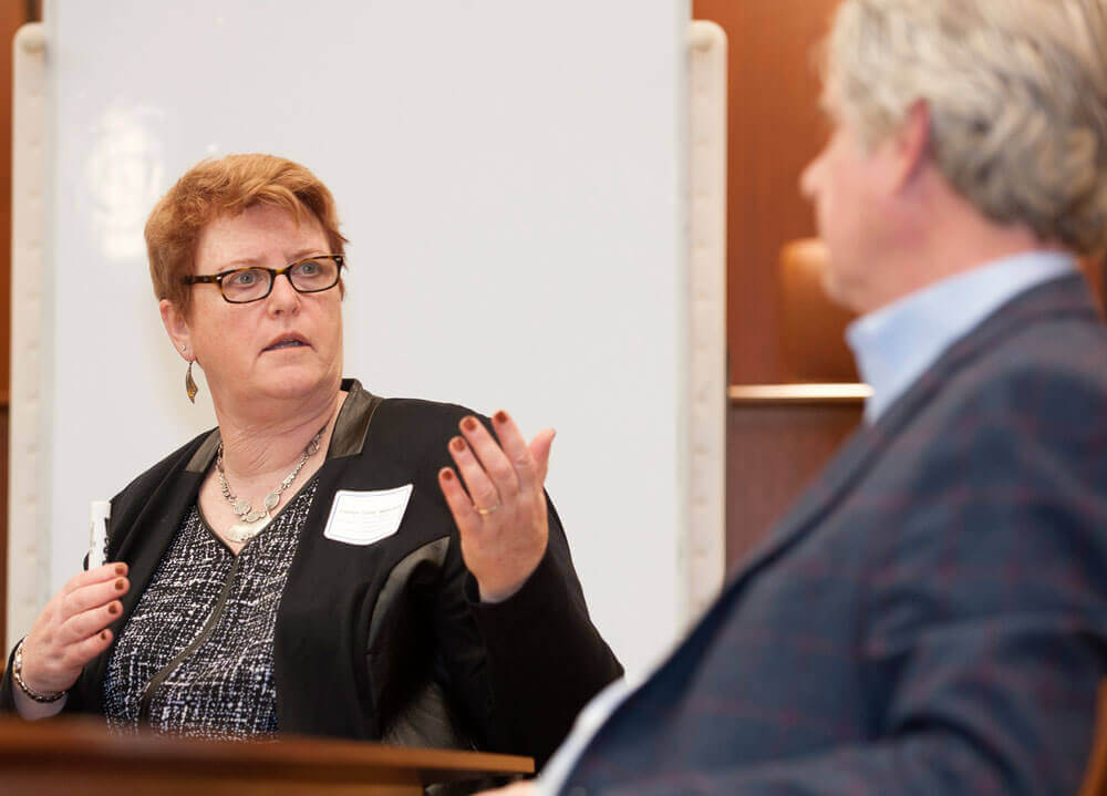 Carolyn Wilkes Kaas speaks with members of the the Center on Dispute Resolution