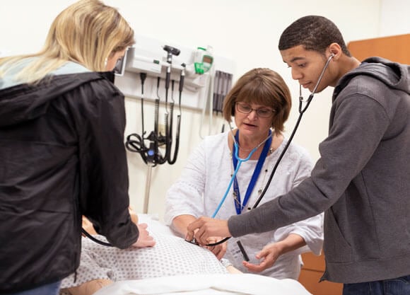 High School student learns how to listen to lung sounds at Quinnipiac’s School of Nursing, during an interactive day on Quinnipiac’s North Haven Campus.