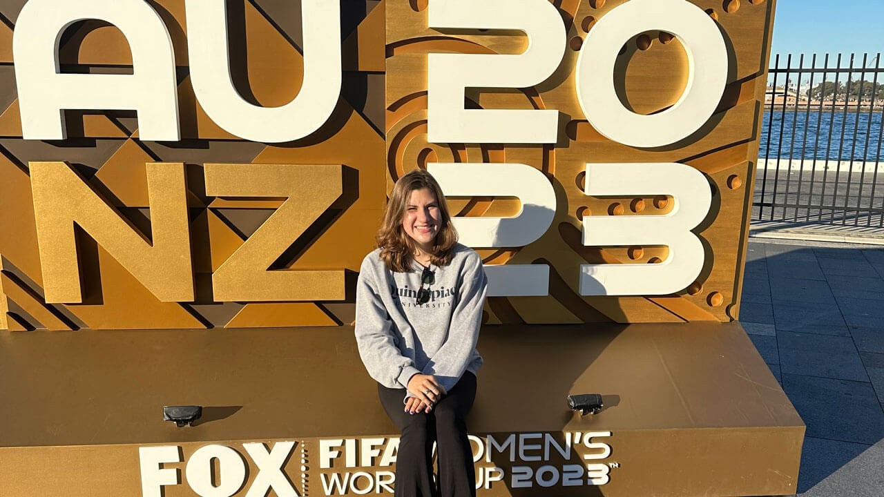 Jacqueline Ydrovo standing in front of Fox News sign