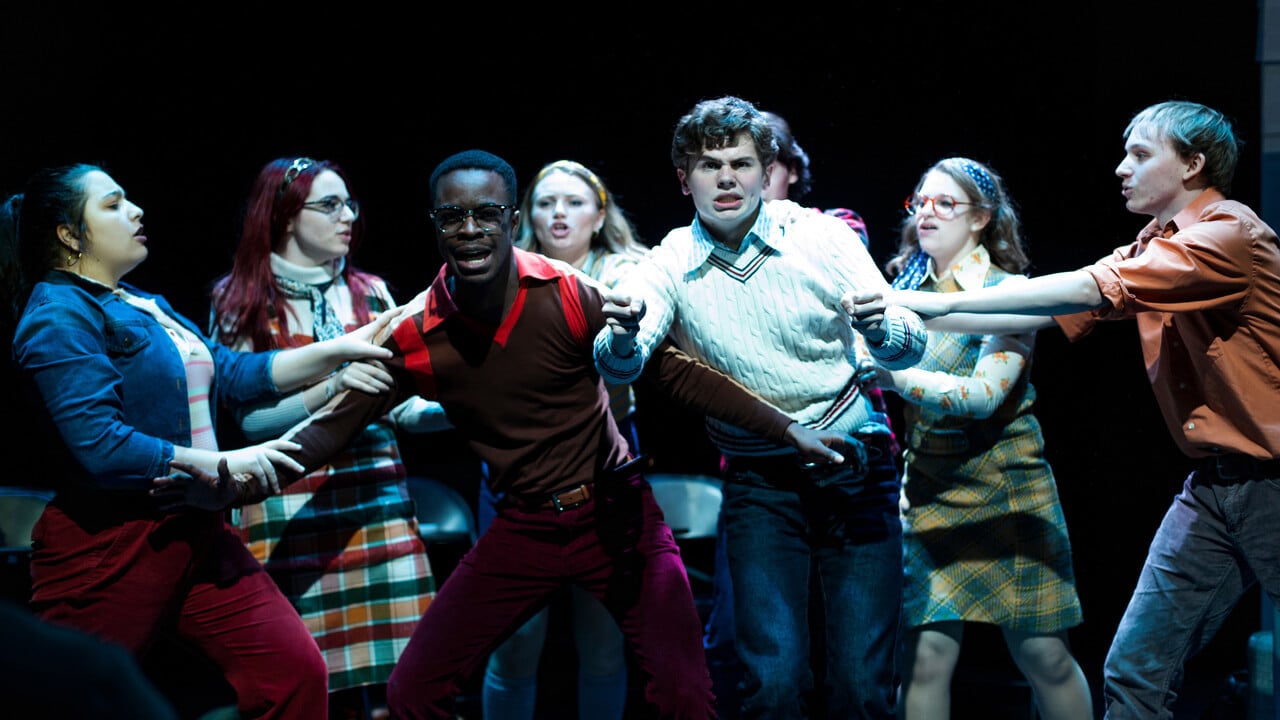 A group of student actors on singing stage for the production, Rage